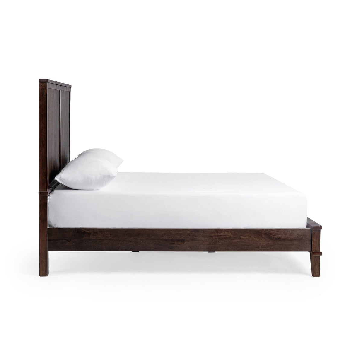 Brown solid wood bed frame with slatted posts and white mattress
