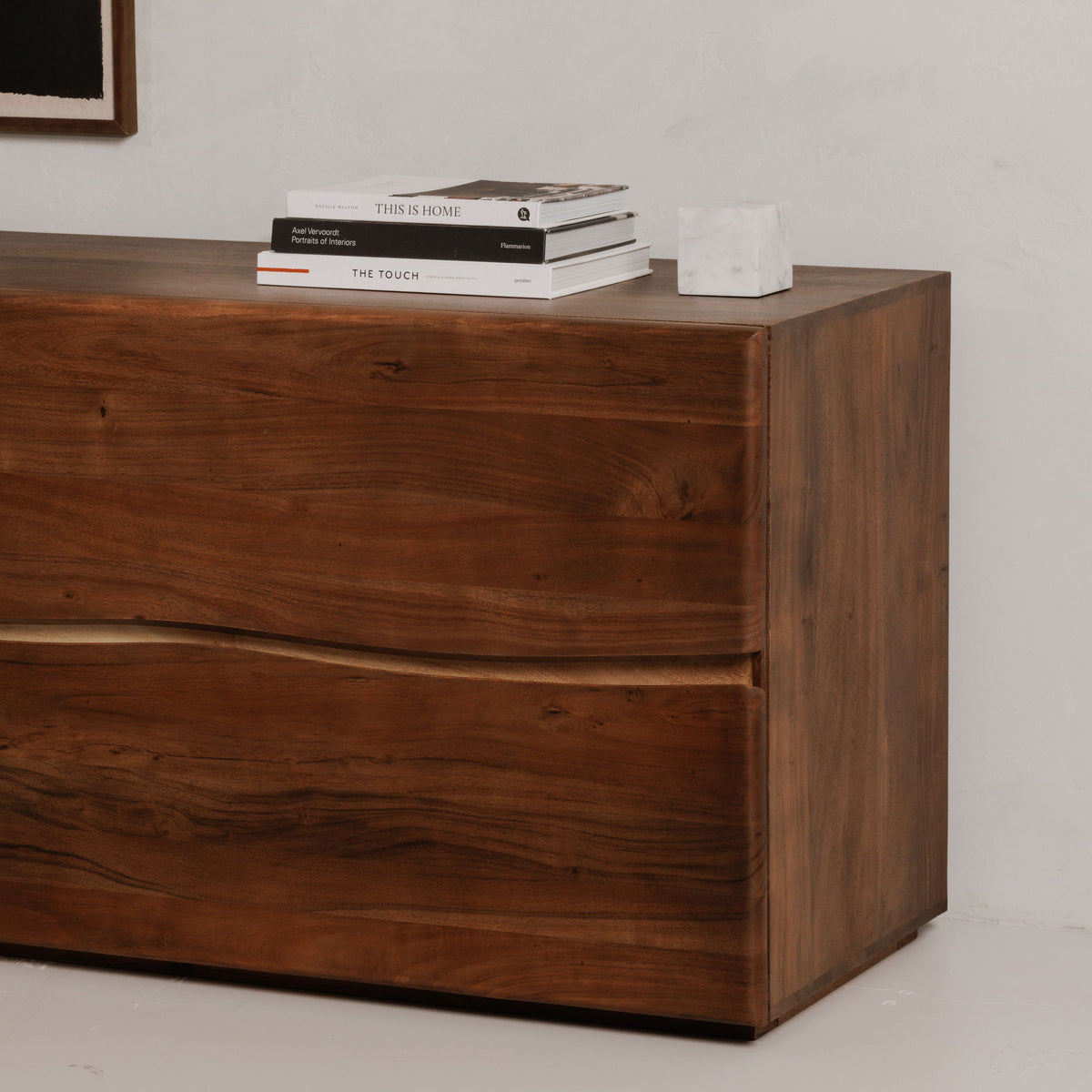 Brown wood 4-drawer dresser side view with recessed drawer pulls