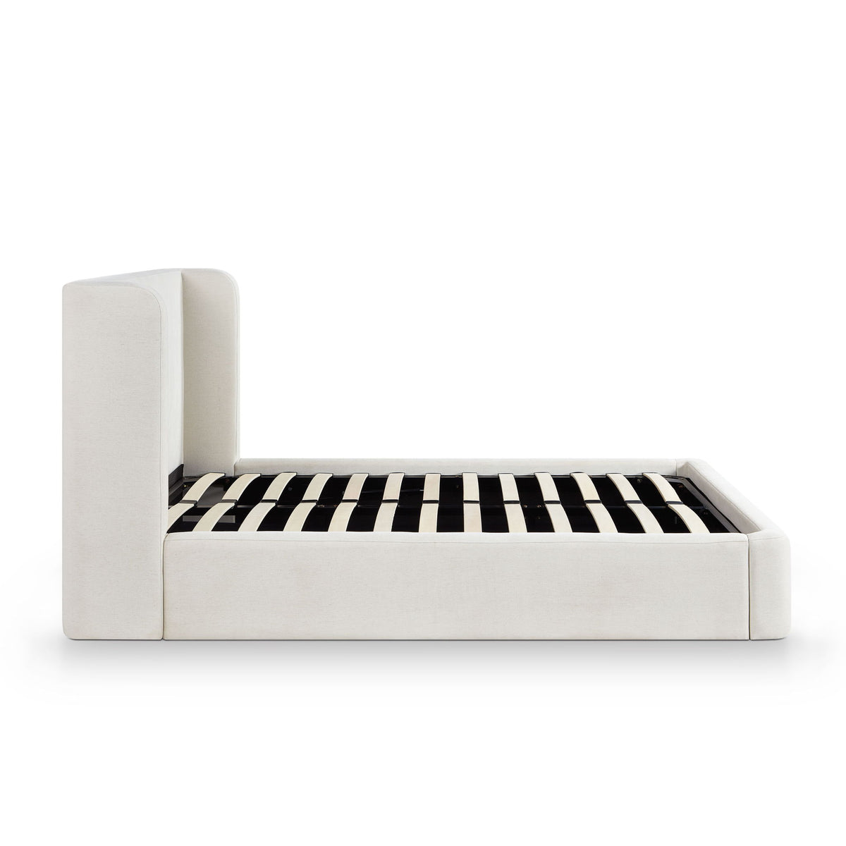 Upholstered platform bed with tall headboard, white frame and black-and-white striped slats