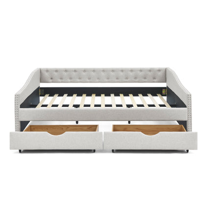 Beige tufted daybed with drawers, slatted mattress base, and waved armrests