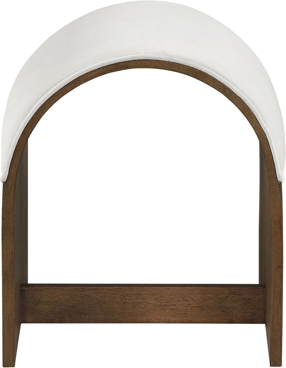White velvet upholstered bench end with arched back and dark wood frame