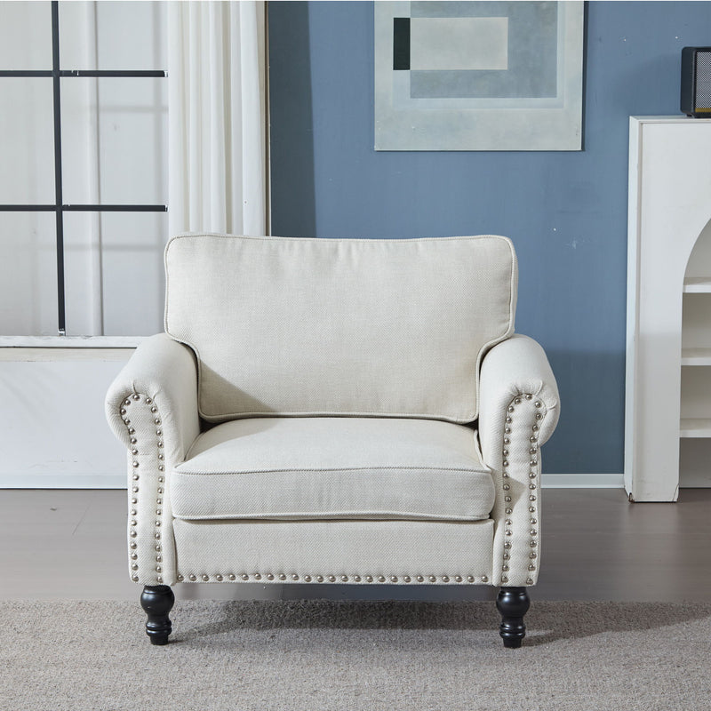 Beige rolled arm single sofa with nailhead trim and dark turned wooden legs