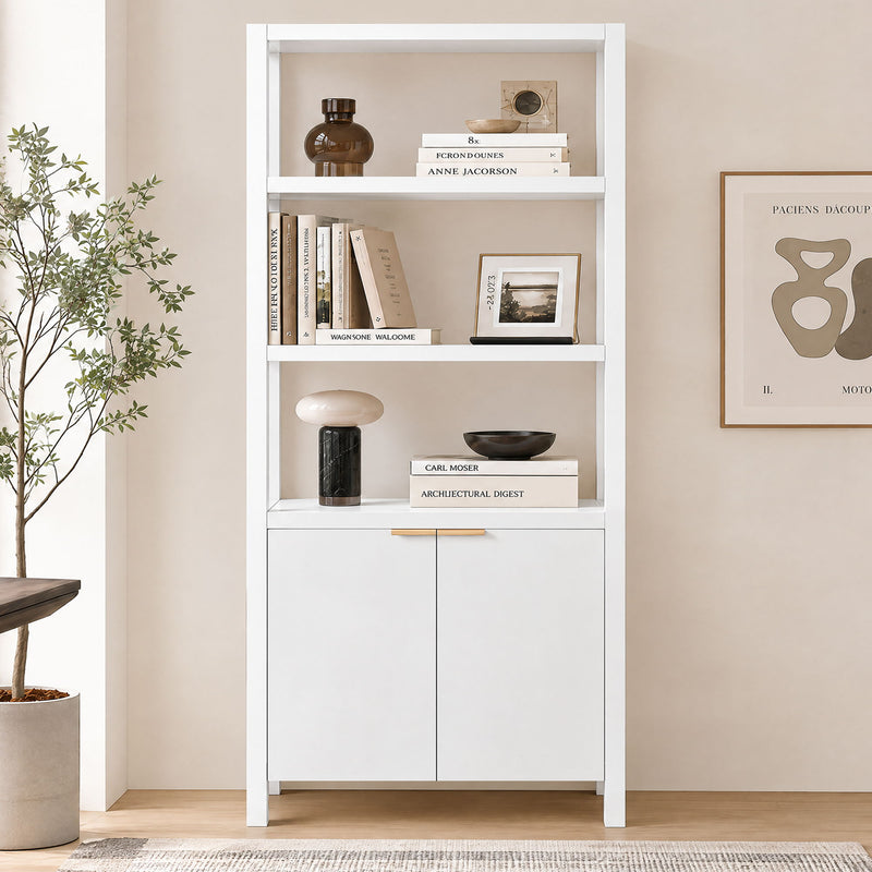 White bookcase cabinet with open shelves and double doors, styled with books and decor