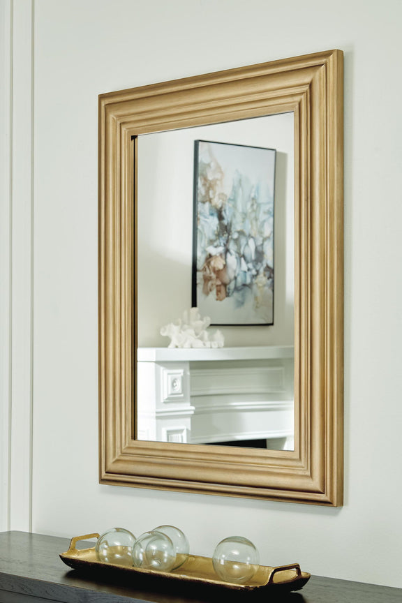 Keneriah gold accent mirror with ornate rectangular frame, wall-mounted style