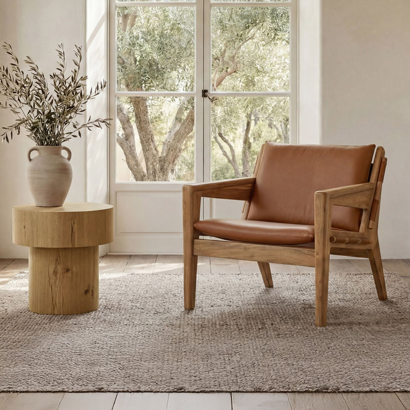 Brown upholstered accent chair with wooden armrests and square front legs