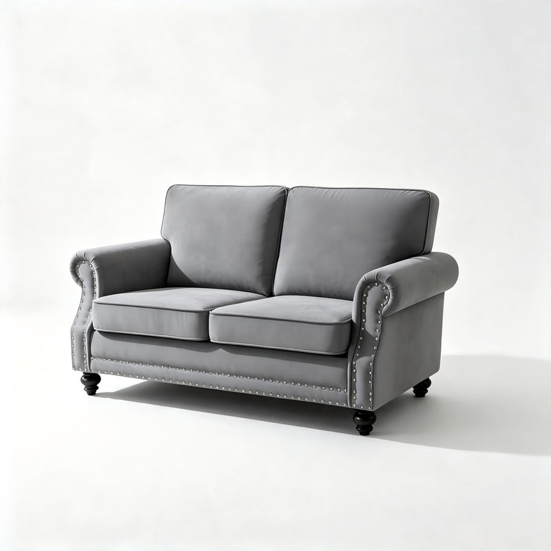 Dark gray 2-seat loveseat sofa with nailhead trim and turned legs, cushioned arms