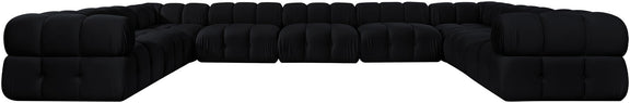 Black velvet performance sectional with tufted cushions and curved corner arms