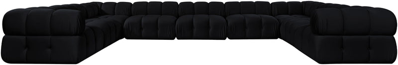 Black velvet performance sectional with tufted cushions and curved corner arms