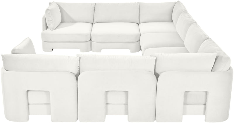 White velvet U-shaped sectional sofa with square cutout detail on front panels
