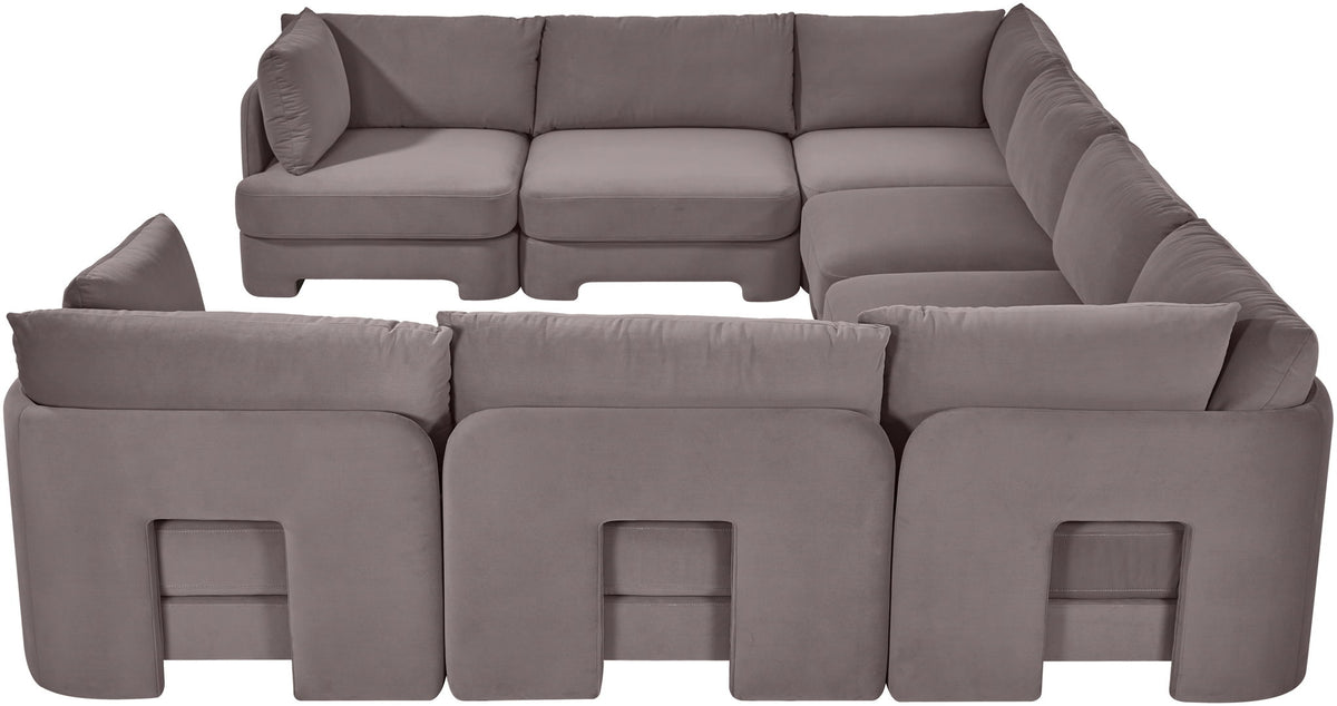 Gray velvet U-shaped sectional sofa with thick arms and square front panel accents