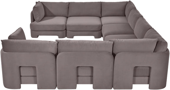 Gray velvet U-shaped sectional sofa with thick arms and square front panel accents
