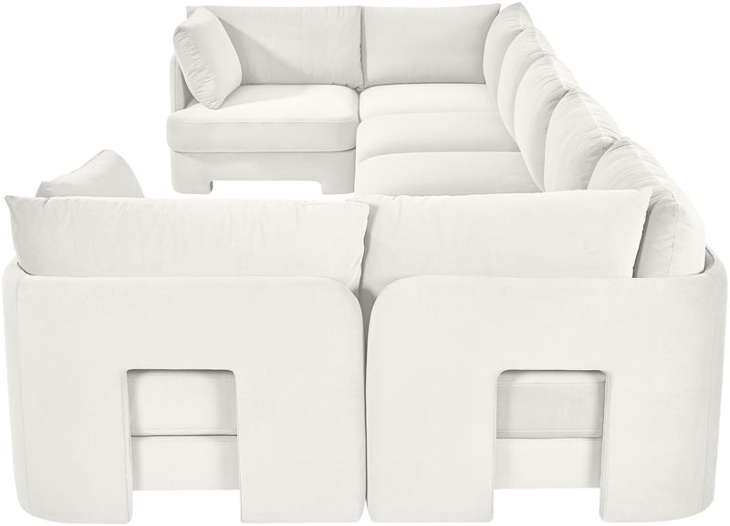 White U-shaped sectional sofa with rounded arms and plush back and seat cushions