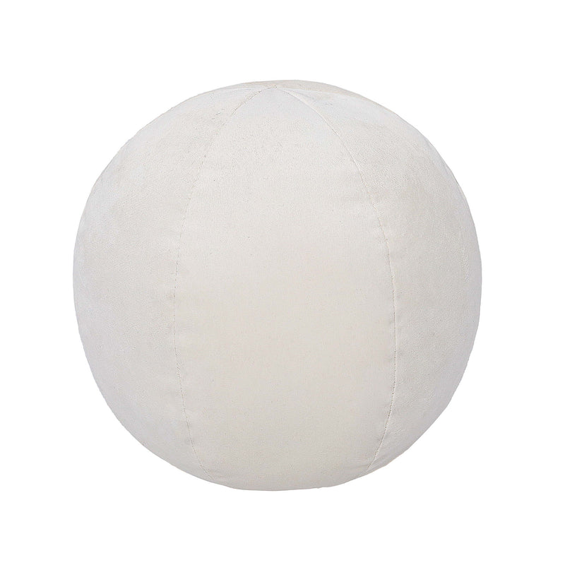 Round pillow with pale cream fabric and curved seam lines.