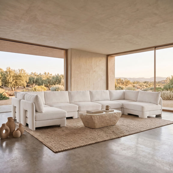Beige velvet performance fabric U-shaped armless sectional with low back cushions.