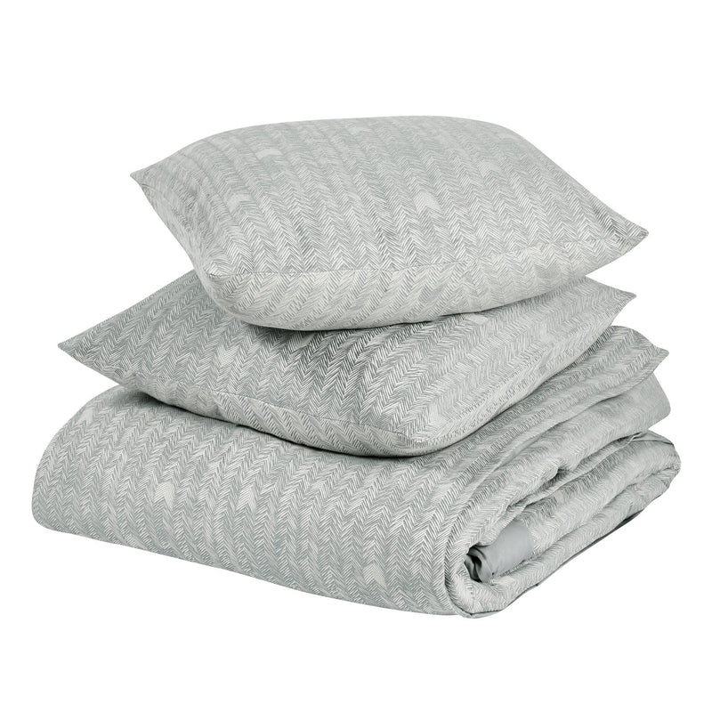 Folded storm gray herringbone duvet set with two shams and rolled duvet