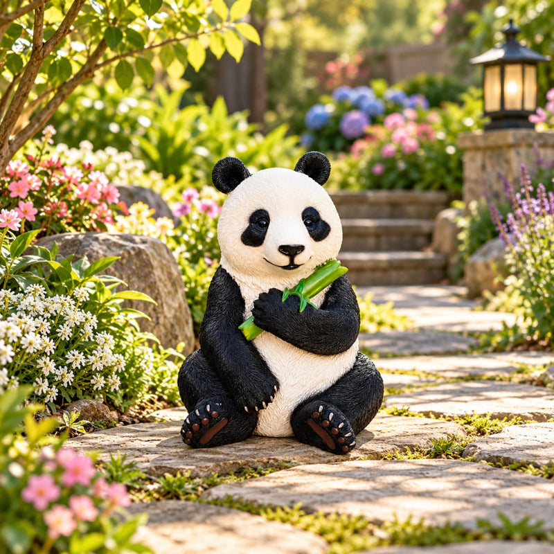 Sitting panda statue holding bamboo, shown at garden scale