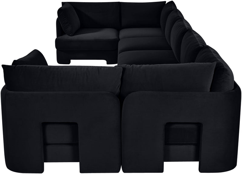 Black U-shaped sectional sofa with rounded arms and thick padded back cushions