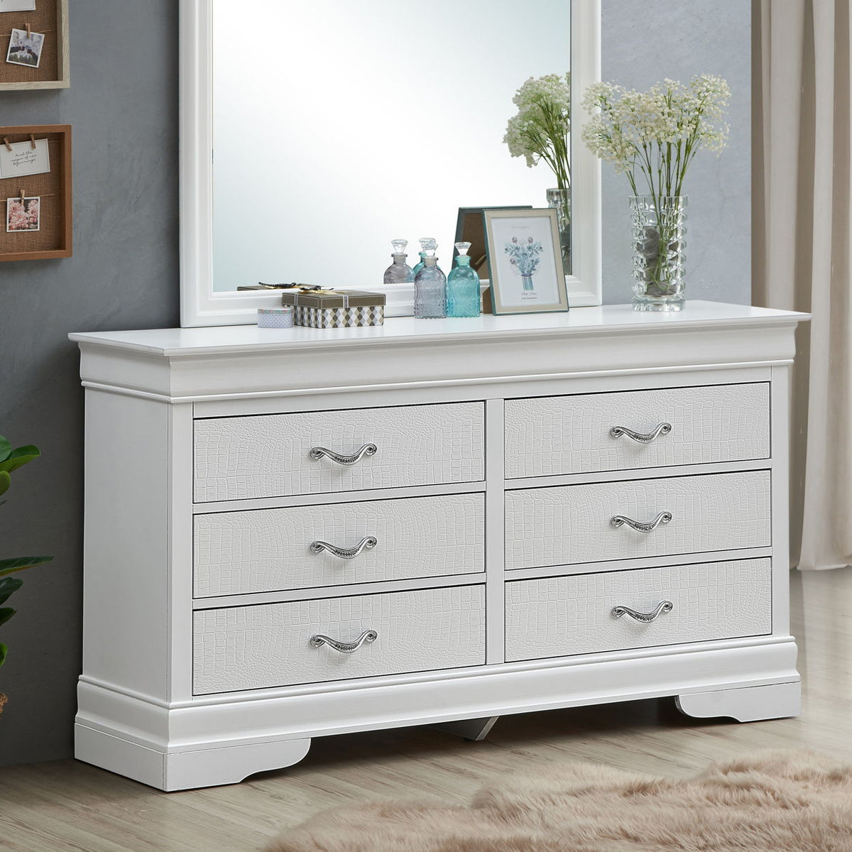 White storage dresser with six drawers and curved metal handles