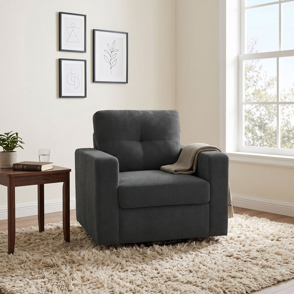 Dark gray upholstered single sofa chair with high back and soft throw blanket