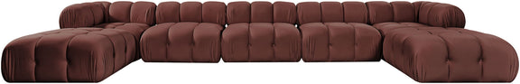 Dark red modular sectional sofa with tufted cushions and rounded ottoman sections