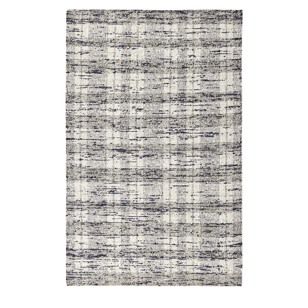 Distressed abstract area rug with light ivory base and dark ink-blue accents