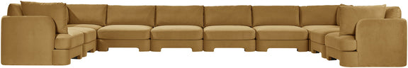 Beige velvet sectional sofa with cushioned arms and modular corner sections