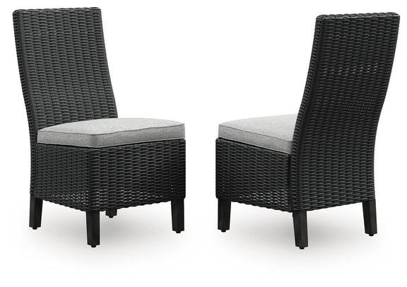 Set of 2 black woven wicker side chairs with light gray seat cushions