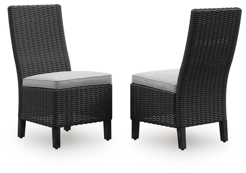 Set of 2 black woven wicker side chairs with light gray seat cushions