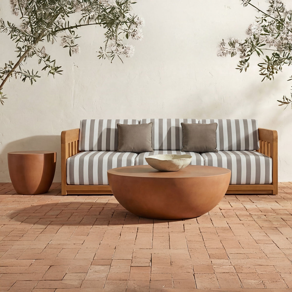 Terracotta side table with wide circular top and tapered bowl body