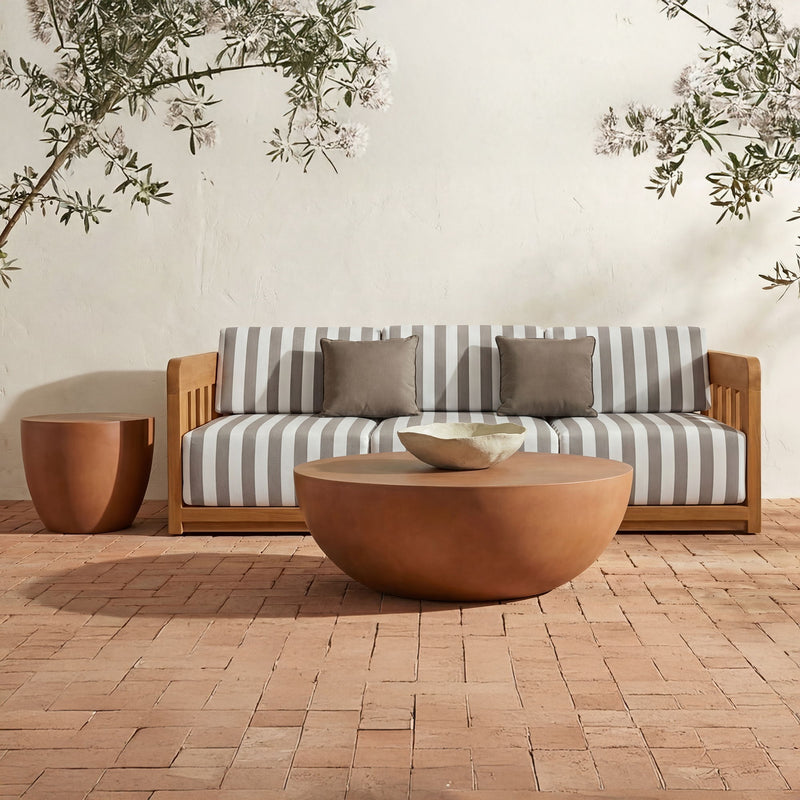 Terracotta side table with wide circular top and tapered bowl body