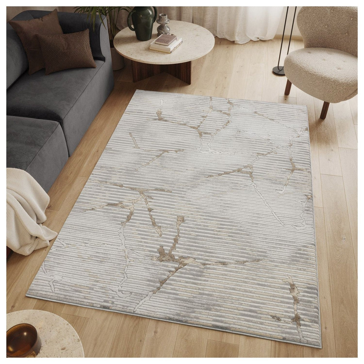 Gray geometric area rug with gold-toned network pattern