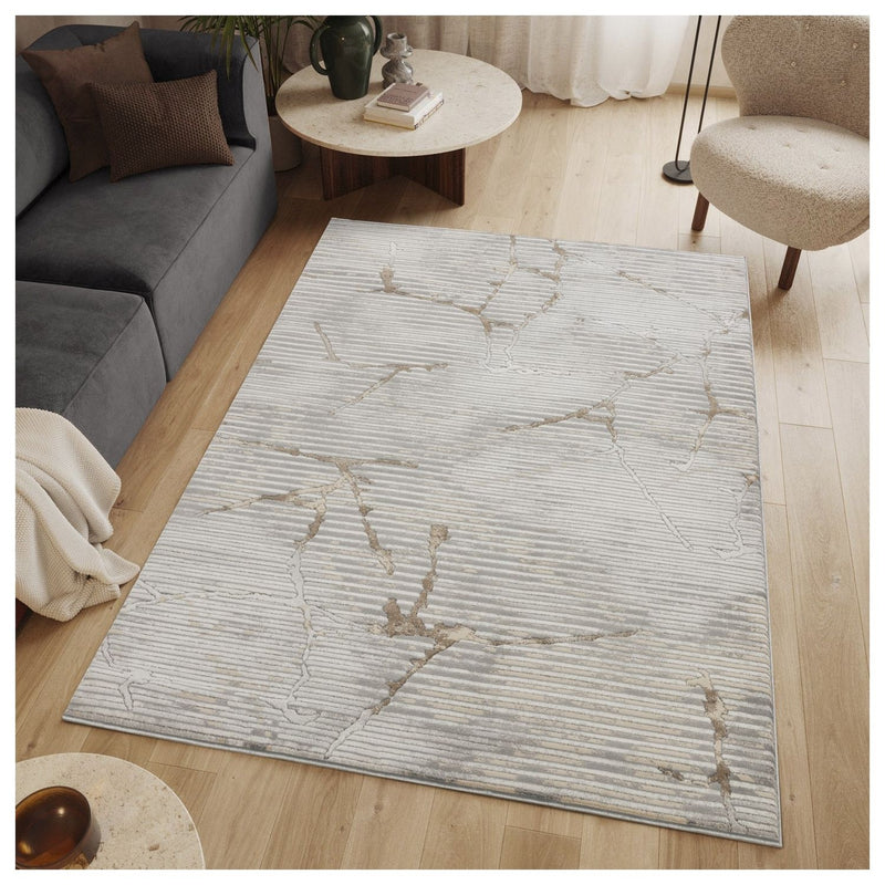 Gray geometric area rug with gold-toned network pattern