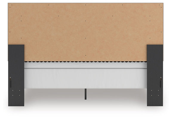 Upholstered panel bed underside view with brown support panel and dark side legs.