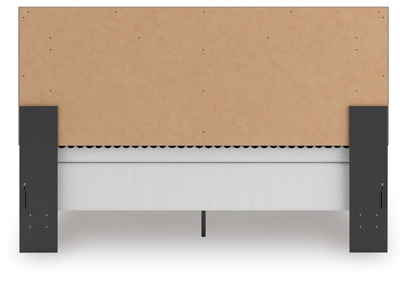 Upholstered panel bed underside view with brown support panel and dark side legs.