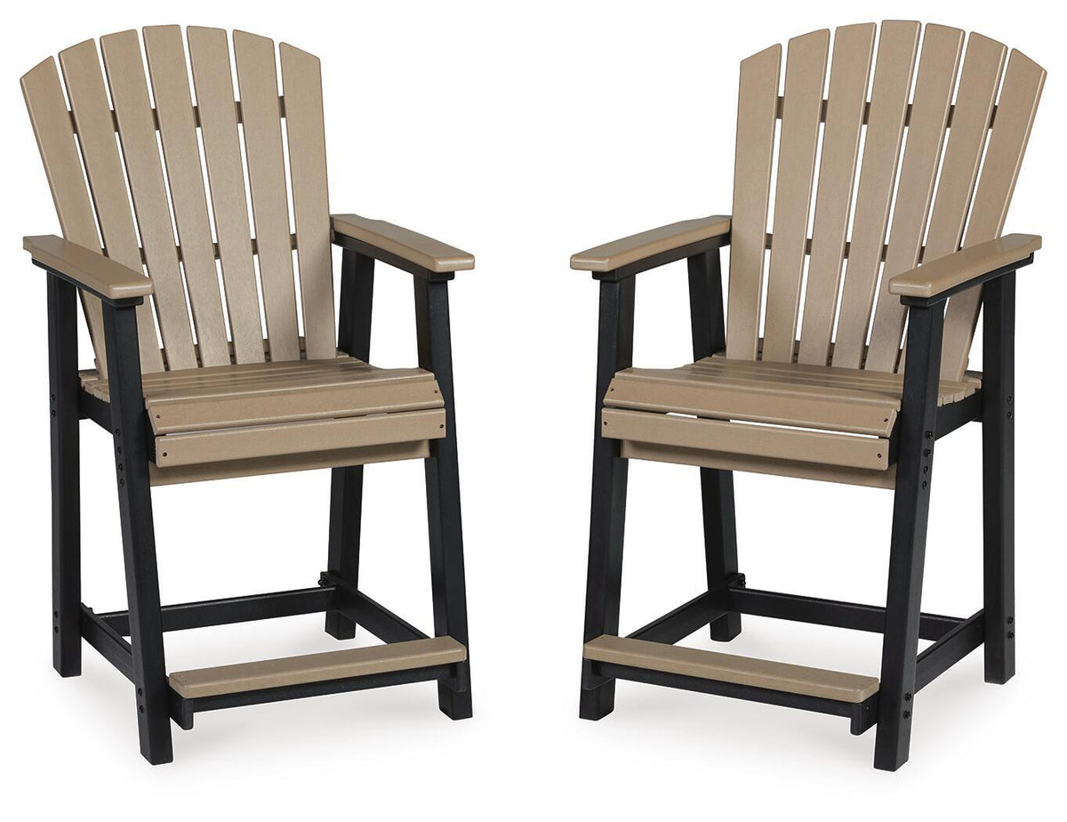 Pair of barstools with black legs, driftwood seat, and slatted backs with armrests