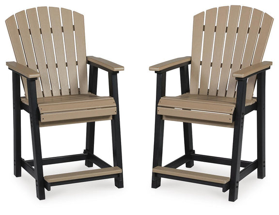 Pair of barstools with black legs, driftwood seat, and slatted backs with armrests