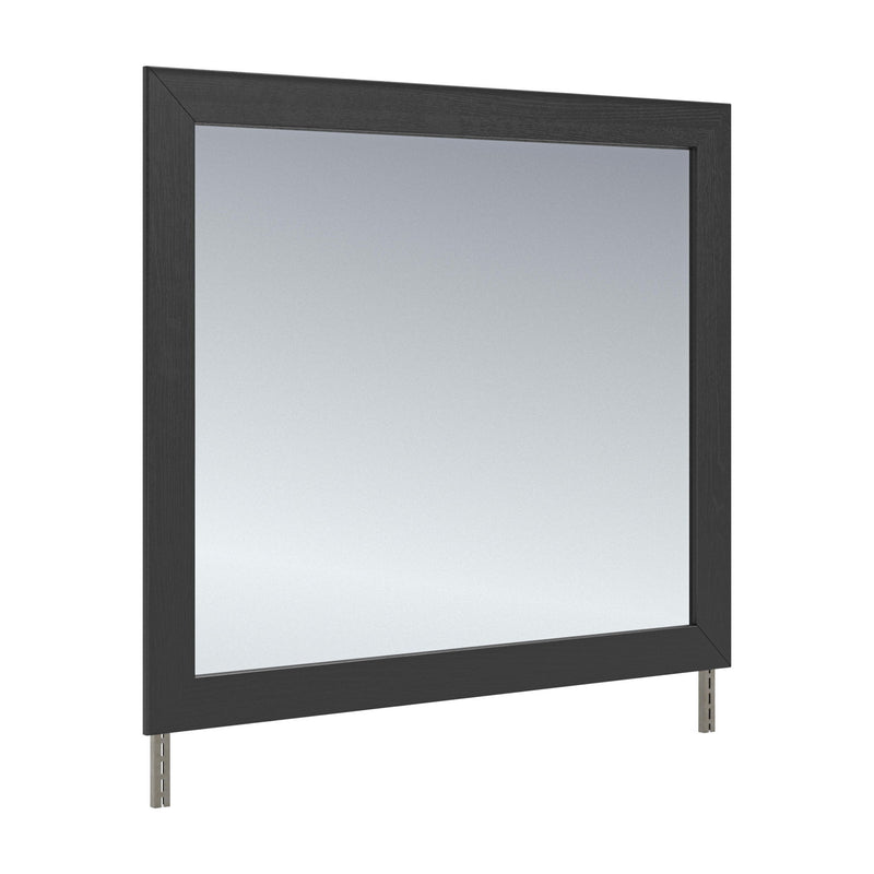Black bedroom mirror with dark wood frame and two metal feet
