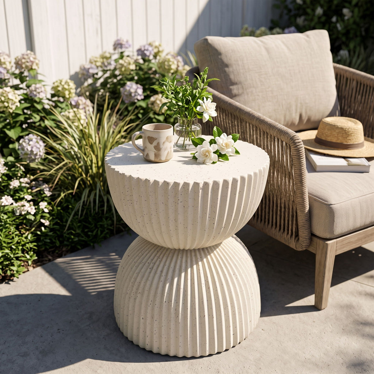 Beige speckled ribbed side table with two stacked ribbed bowl shapes