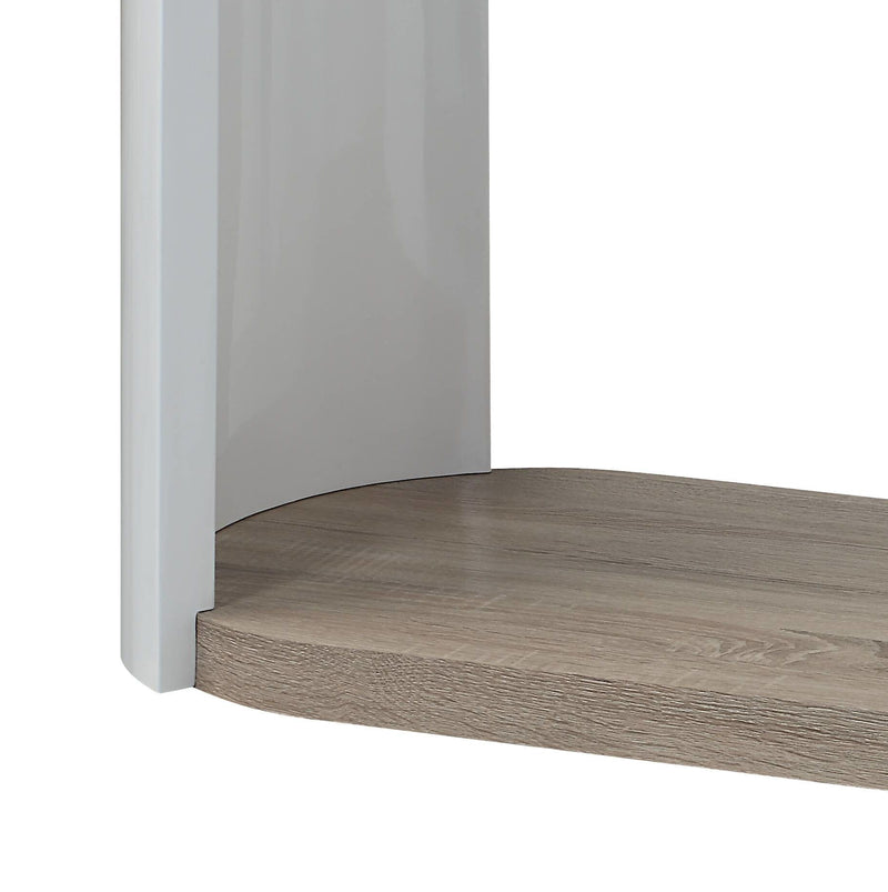 Sofa table side view with white curved legs and oak lower shelf beneath the top
