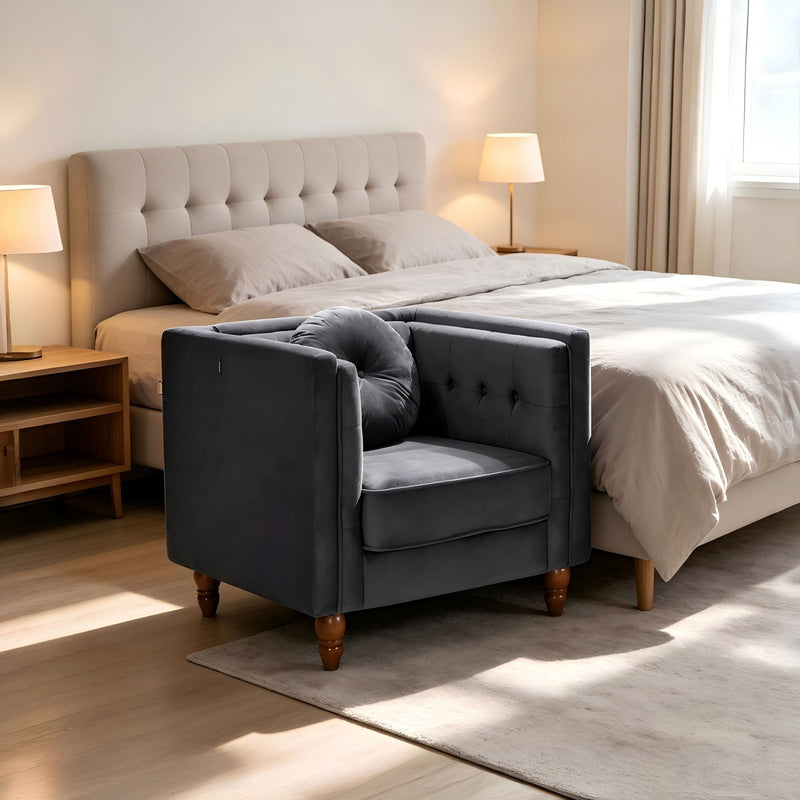 Dark gray tufted accent side chair with square arms and button back detail