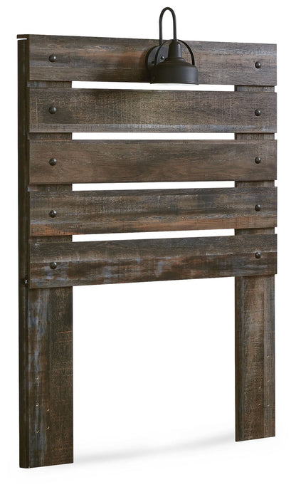Rustic wood panel headboard with black lamp on top, vertical posts