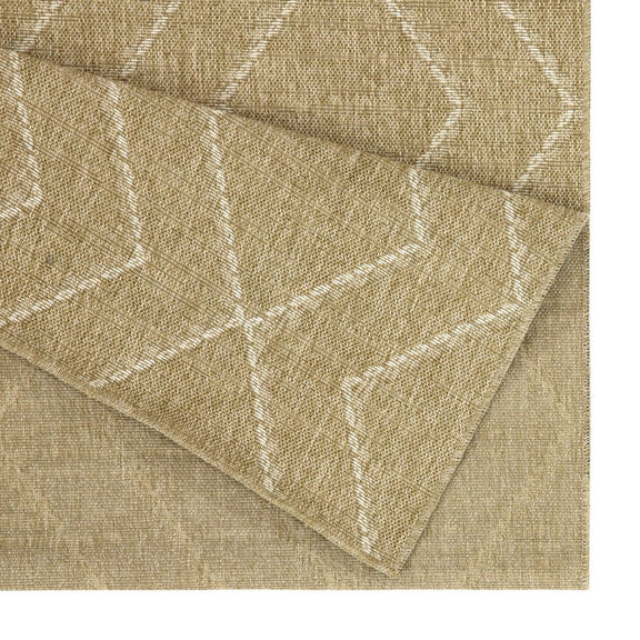 Close-up light brown jute area rug with stitched geometric pattern and woven texture.