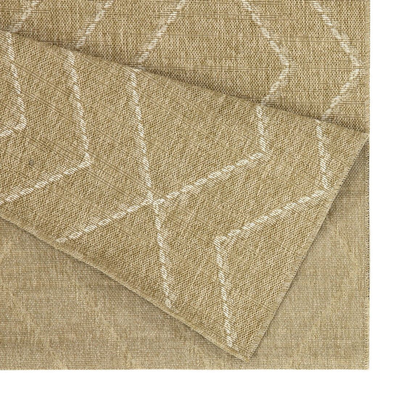 Close-up light brown jute area rug with stitched geometric pattern and woven texture.