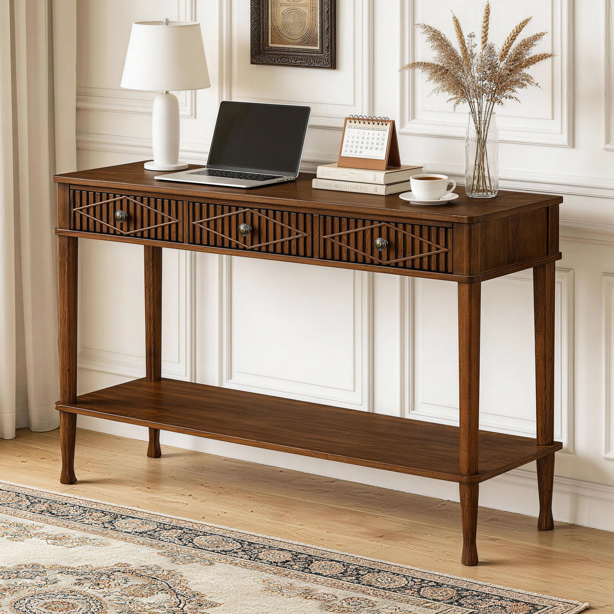 Walnut console table with three diamond-pattern drawers and a long open lower shelf