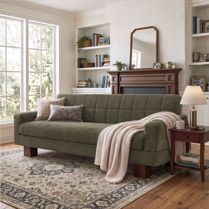 Two-seater loveseat sofa with dark green fabric, tufted back and square arms