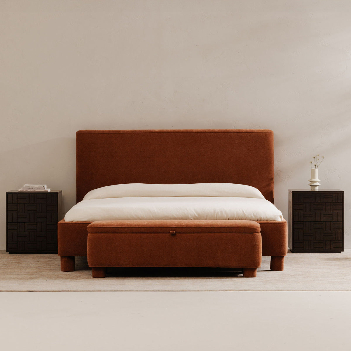 Deep orange upholstered storage bench with rectangular hinged lid
