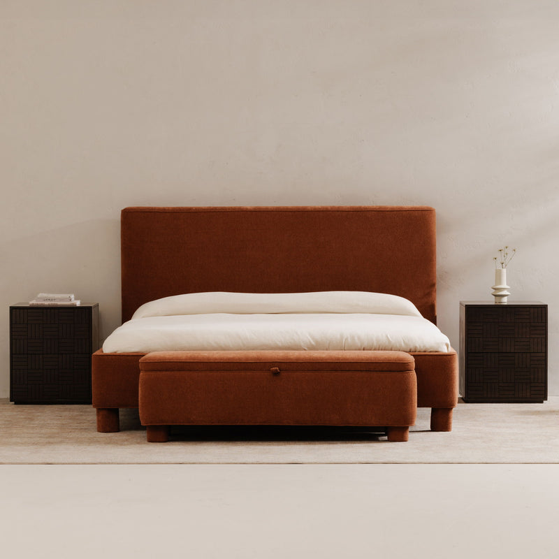 Deep orange upholstered storage bench with rectangular hinged lid