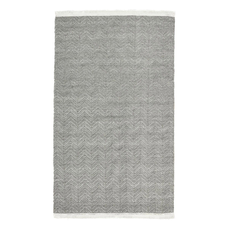 Augusta indoor/outdoor rug in light gray with chevron pattern texture and fringed ends