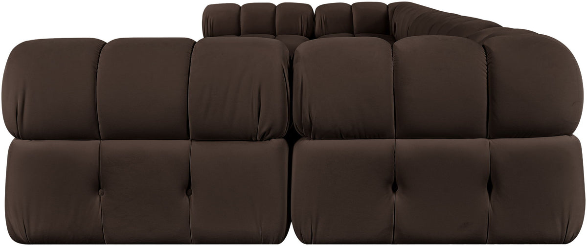 Dark brown modular U-shaped sectional sofa with tufted cushions and cushioned chaise blocks