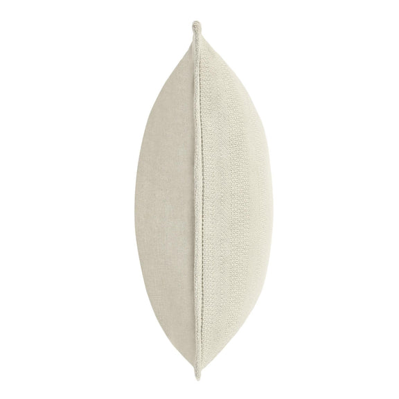 Natural textured throw pillow side view with centered seam and piped edge